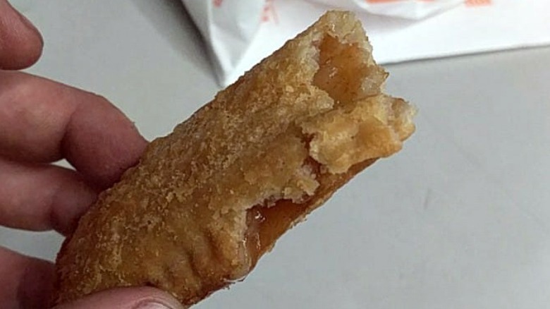 Person holding a Whataburger Hot Apple Pie