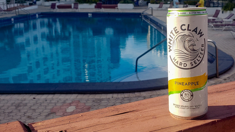 Pineapple White Claw can by pool