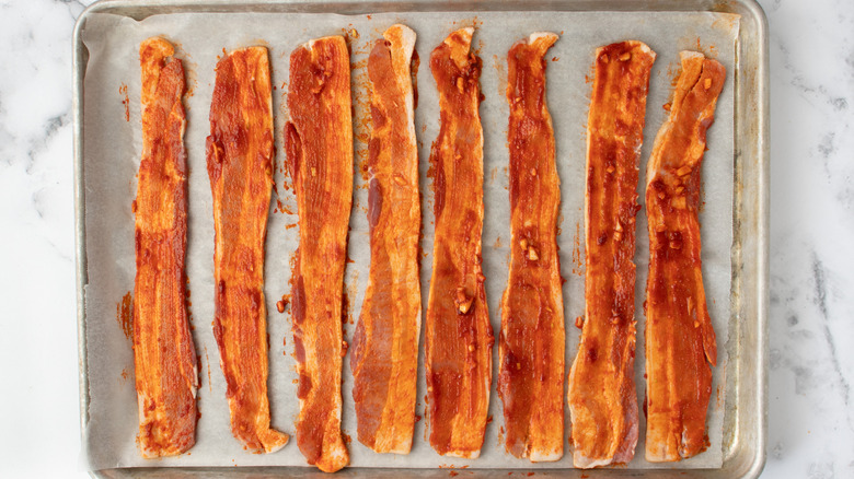 gochujang coated bacon on sheet