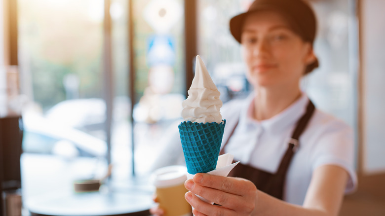 fast food worker with ice cream cone