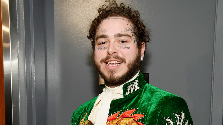 Post Malone green velvet suit