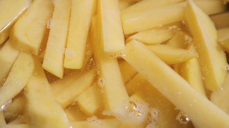 chipped potatoes in water