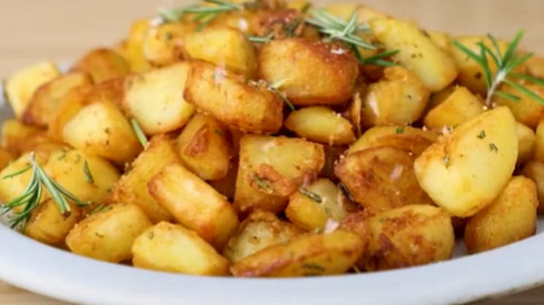 crispy garlic potatoes on plate