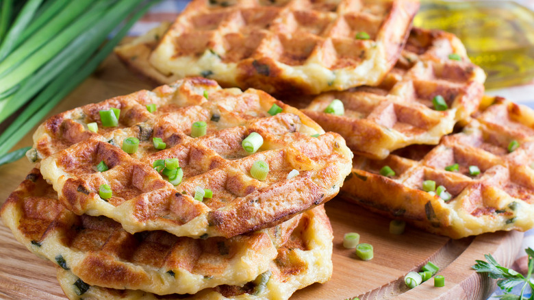 potato waffles served on wooden board