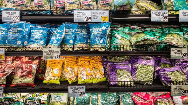 packed salads in fridge display