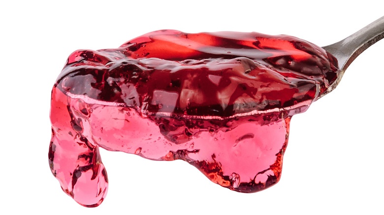 Red jelly on a teaspoon