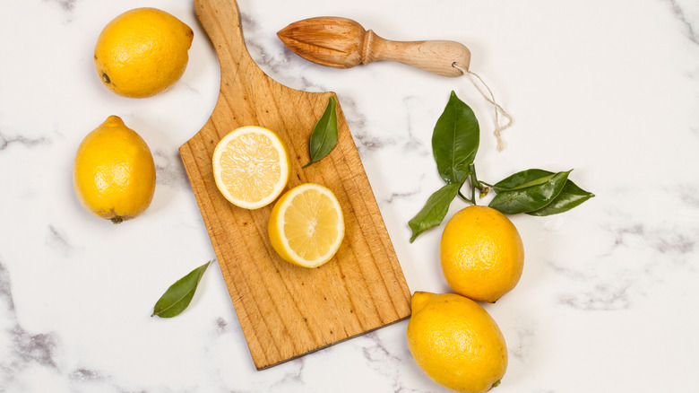 lemons on cutting board