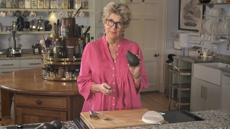 Prue Leith holding an avocado