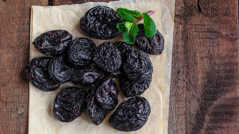 dried prunes on paper