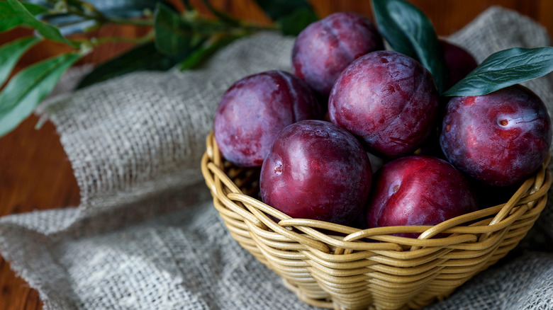 plums in a basket