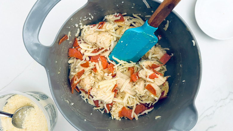 blue rubber spatula with biscuits