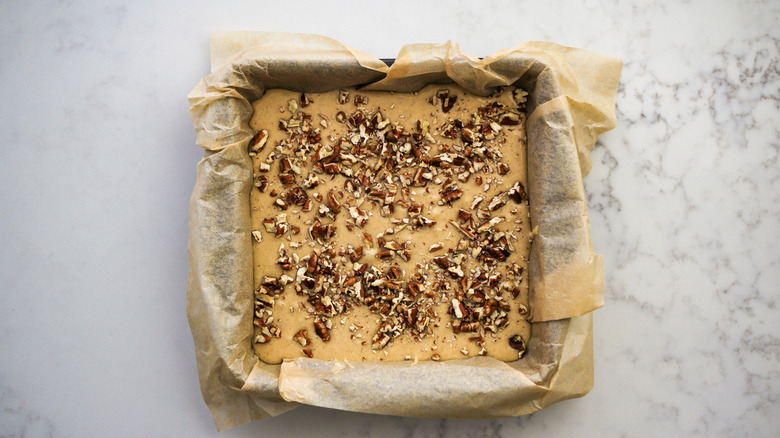 fudge with pecans in pan