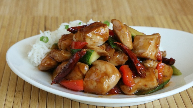 A plate of rice and M.Y. Asia Kitchen General Tso's Chicken