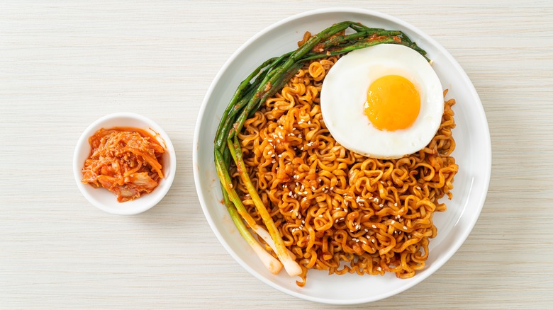 A bowl of ramen with fried egg