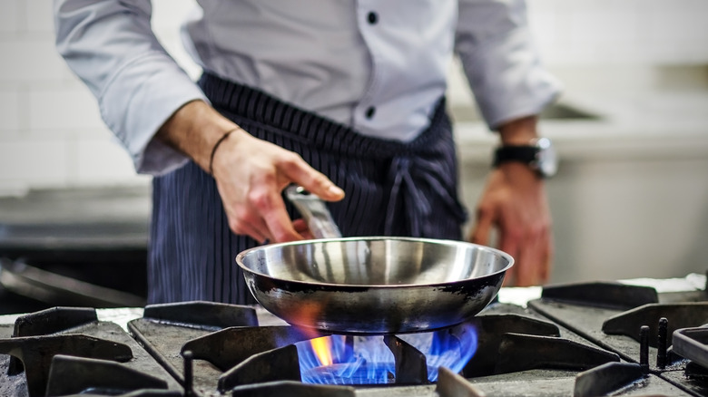 chef at gas stove