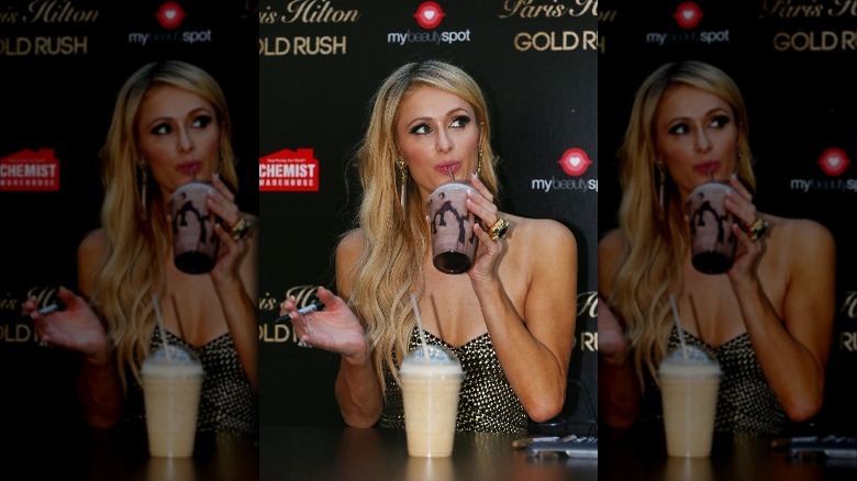 Paris Hilton drinking a milkshake