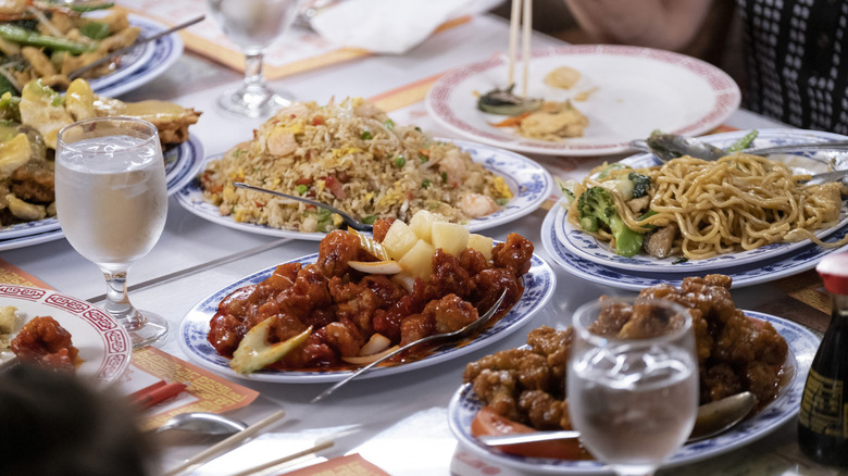 A variety of Chinese food dishes on a table