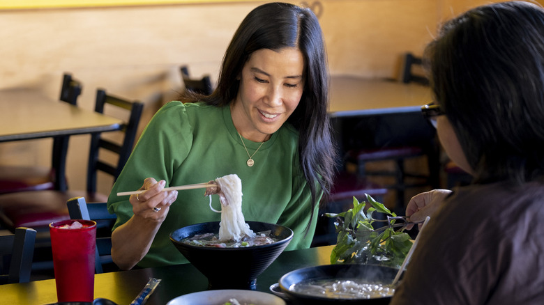 Lisa Ling eating in a restaurant