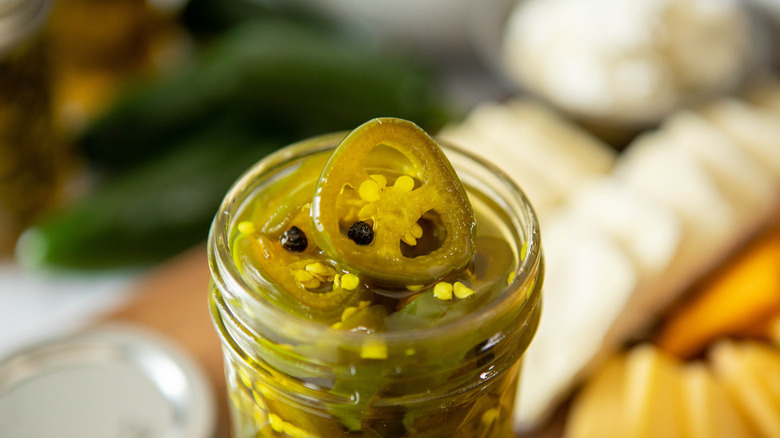 sliced jalapeños in a jar