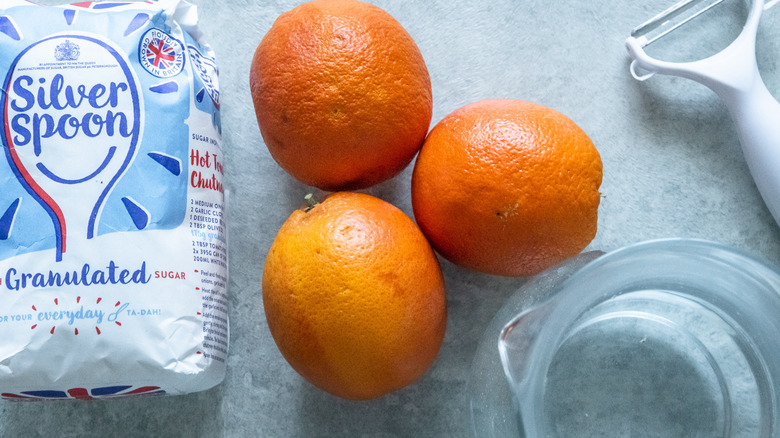 sugar, oranges, peeler, water, ingredients