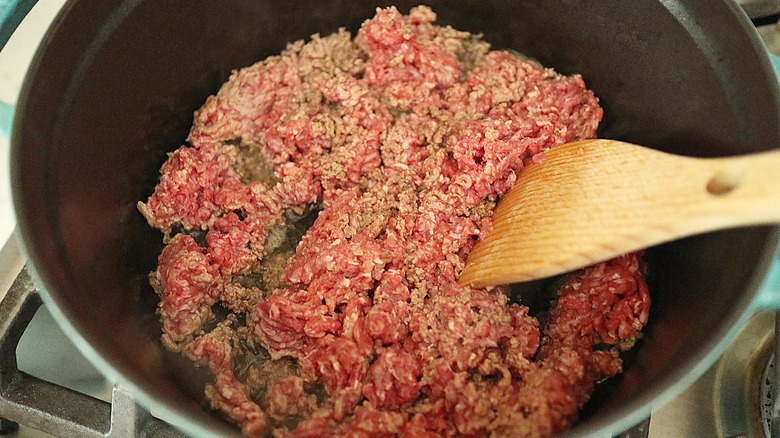 ground beef cooking in pot