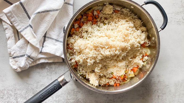 rice, veggie mixture in pan