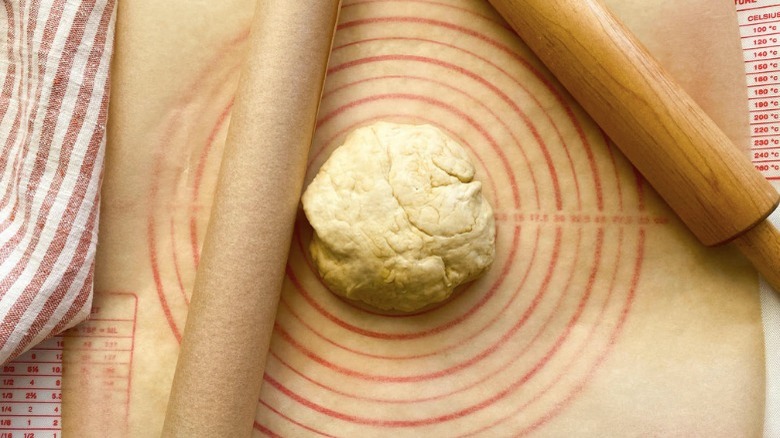 pizza dough on mat