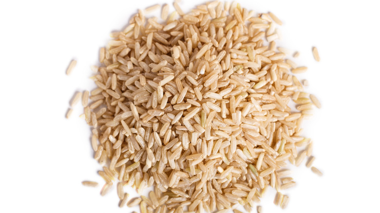 brown rice on white background