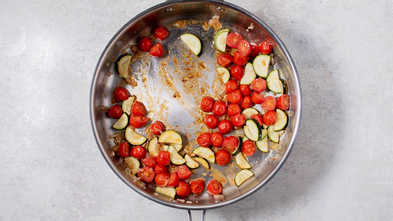 cooking veggies in a pan
