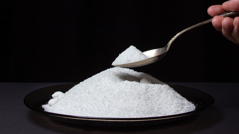 Pile of salt with spoon