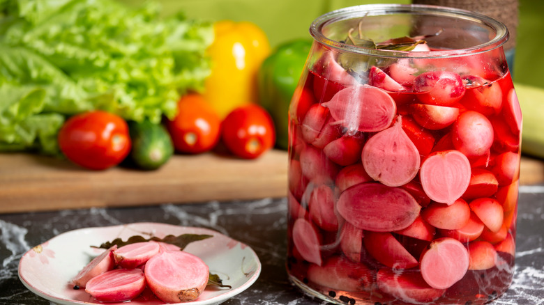 Pickled radishes in jar