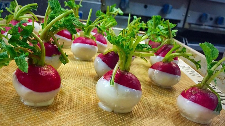 Radishes dipped in butter