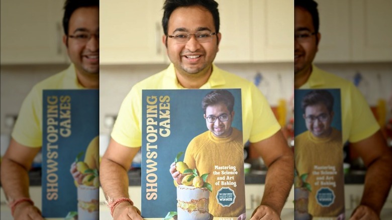 Rahul Mandal with his cookbook