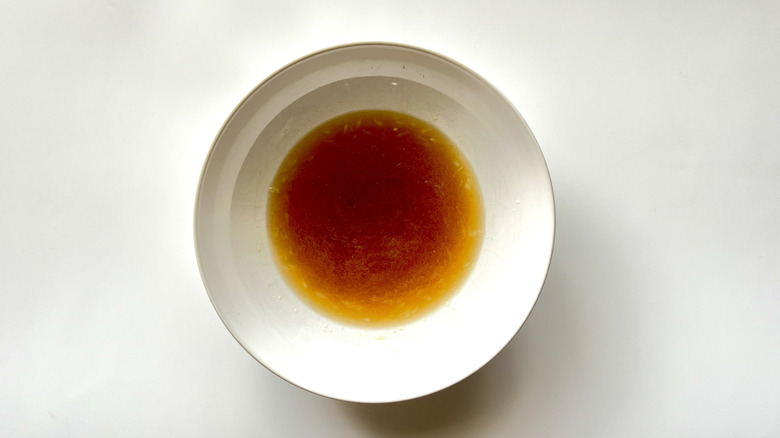 brown liquid in white bowl