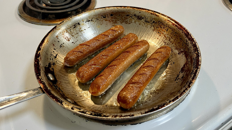 hot dogs in frying pan