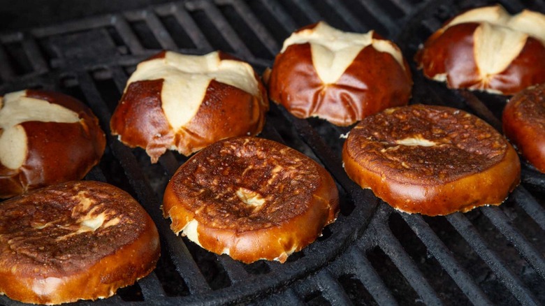 pretzel buns on a grill