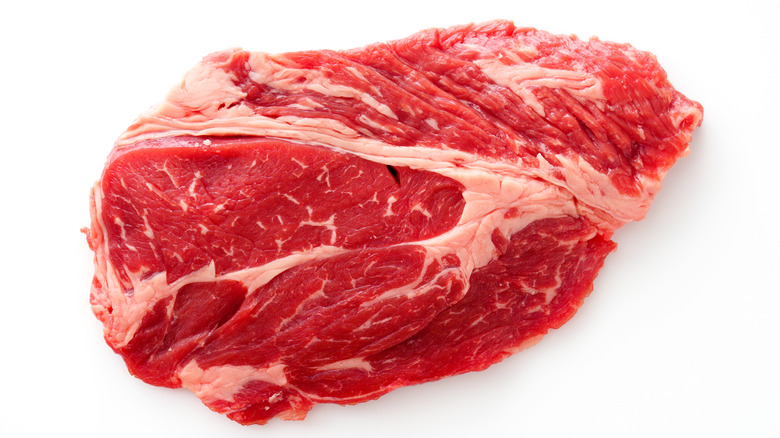 Chuck steak on white backdrop