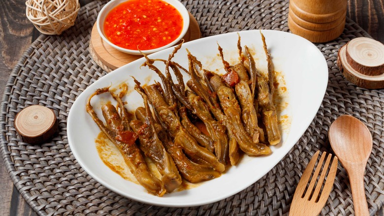 Duck tongues on white plate