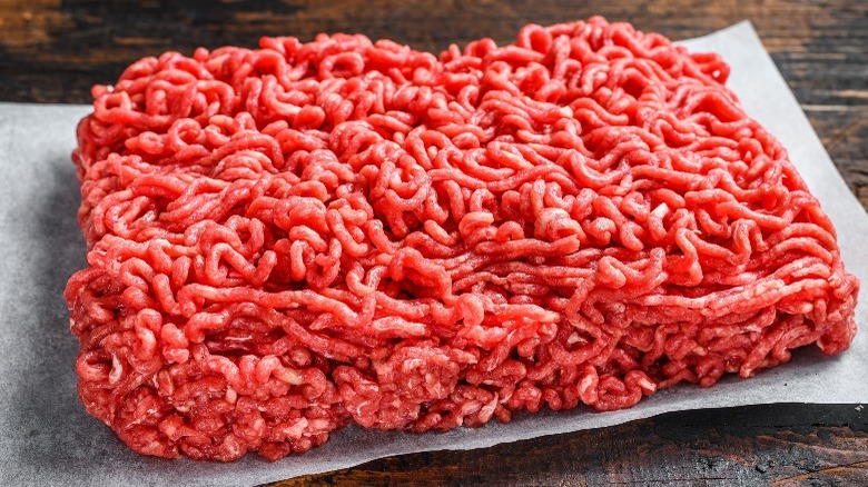 Ground beef on white paper