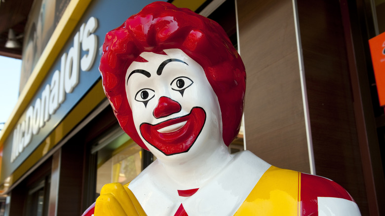 Creepy smile painted on Ronald McDonald statue 