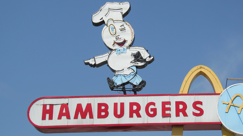 Speedee mascot atop McDonald's sign