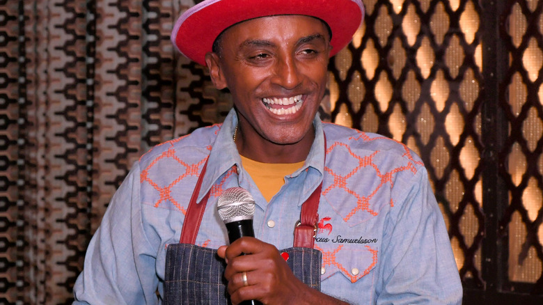 Marcus Samuelsson smiling with microphone