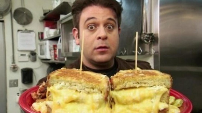 Adam Richman finishing the Melt Challenge