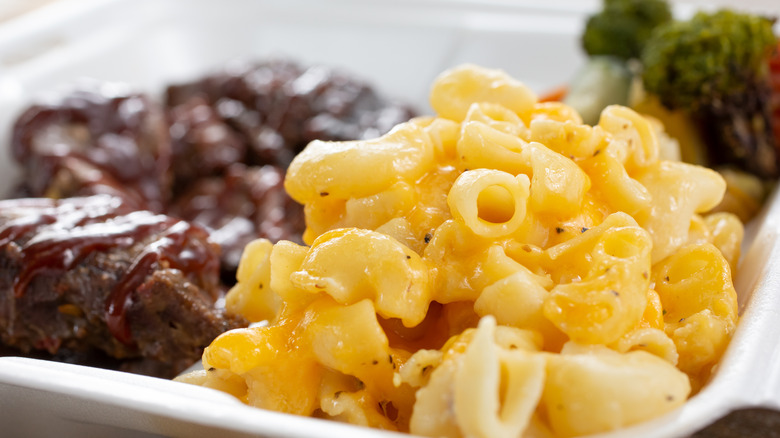 Mac and cheese alongside a brisket