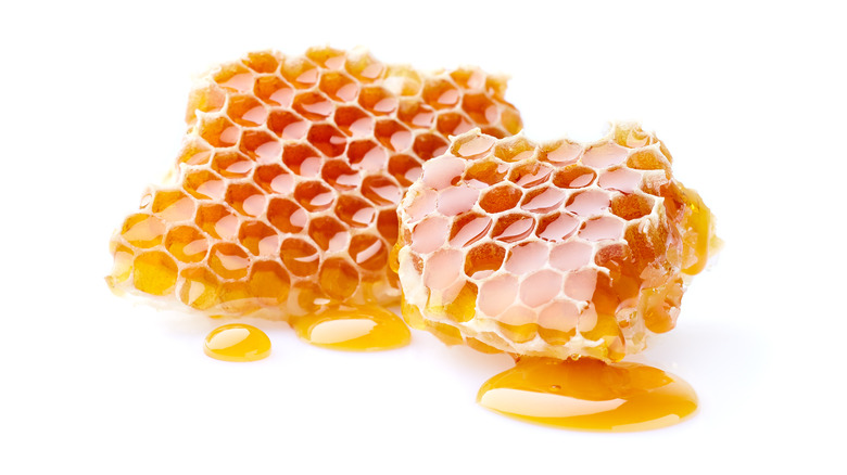 honeycomb with honey dripping