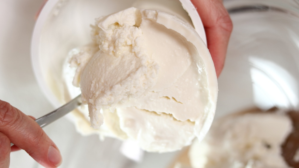 taking ricotta out of its container