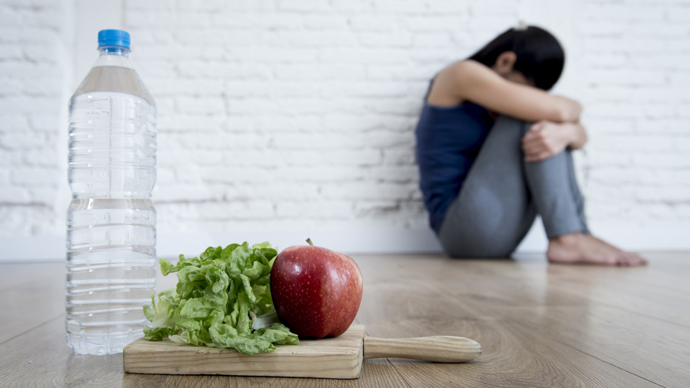 Girl feeling unwell on vegan diet