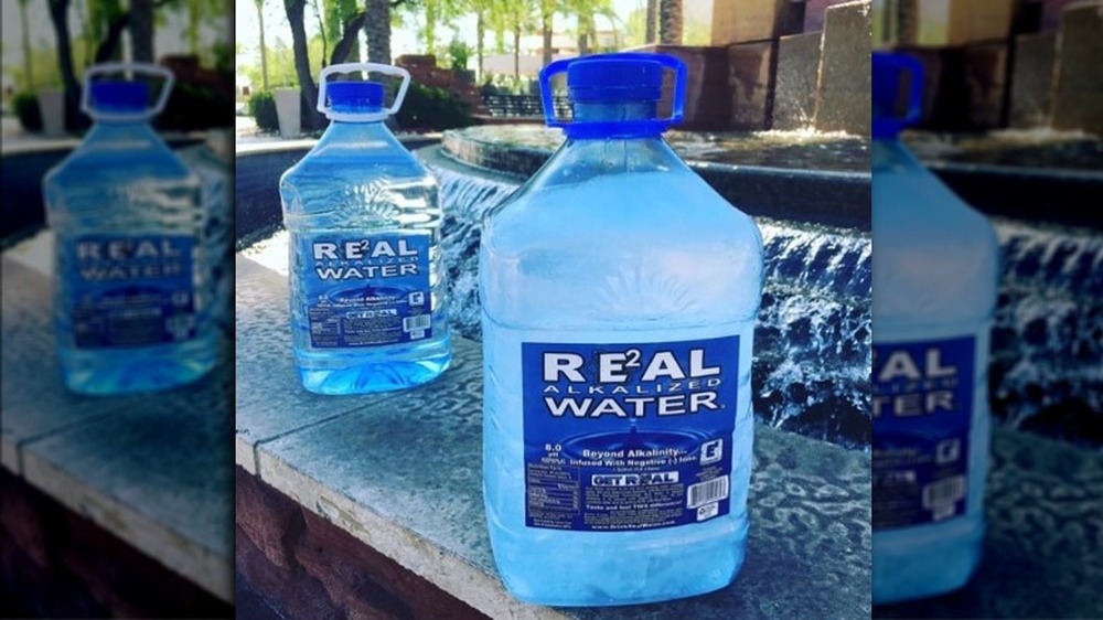 Real Water jugs next to a water fountain