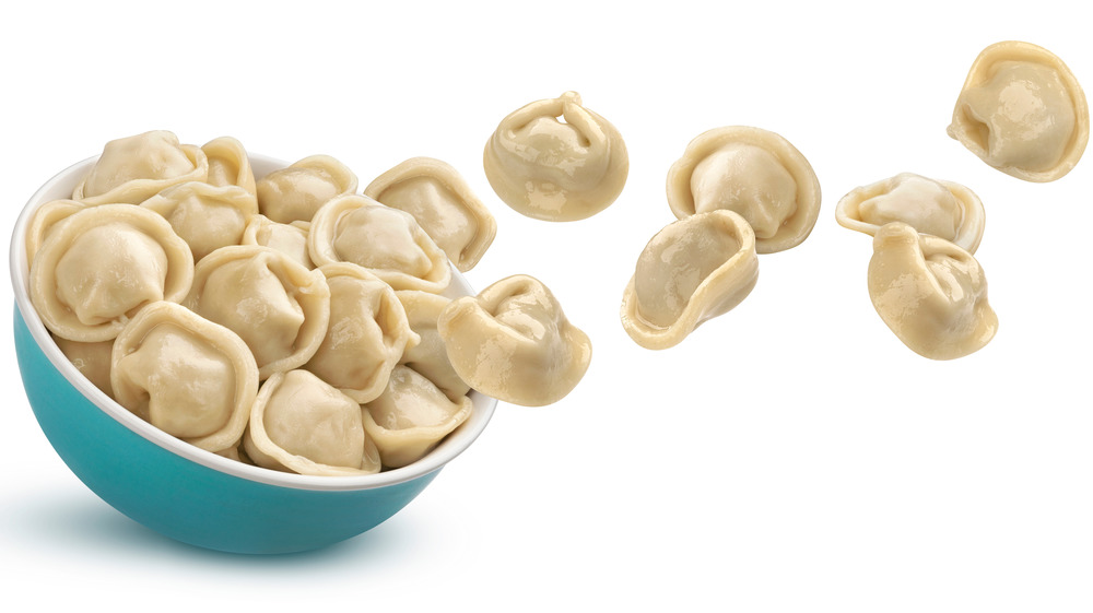 Tortellini spilling out of bowl