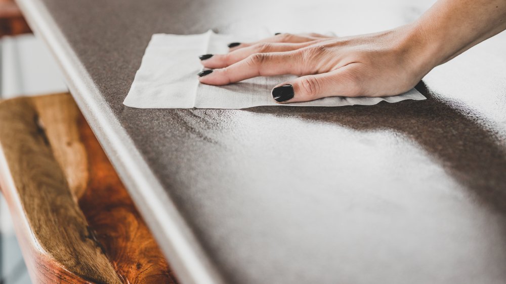 woman cleaning her counter